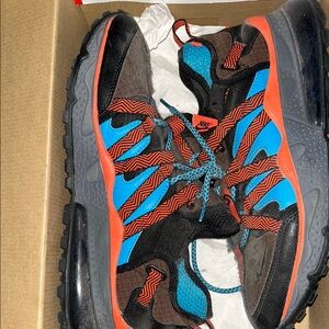 Nike Blue and Black Sneakers with Dynamic Design